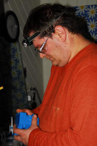 Jonathan prepares to replace an old box with a new one.